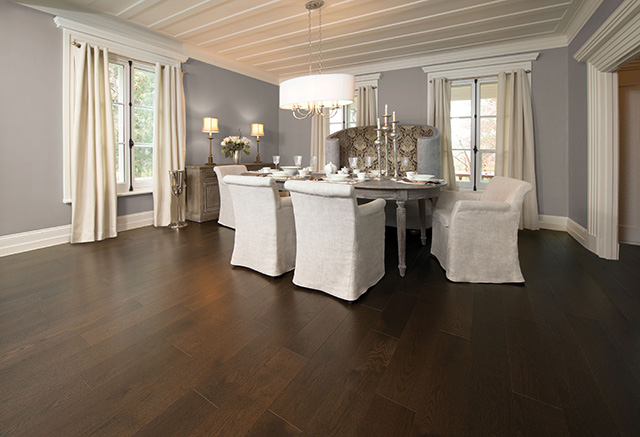 Dark brown hardwood floor dining room scene